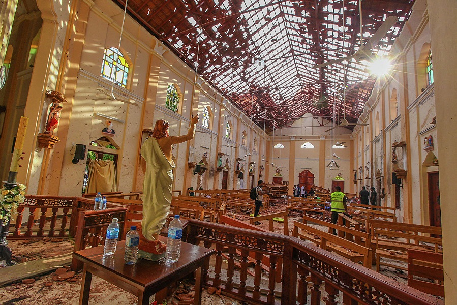 Bombs tear through Sri Lankan churches and hotels, killing 290 people