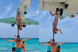 Travellers slammed for &#039;close call&#039; plane stunt at famous beach (Video)