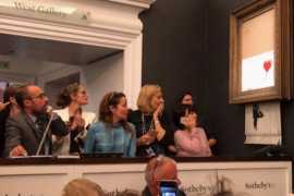 Banksy painting ‘self-destructs’ moments after being sold for $1.4 million at auction